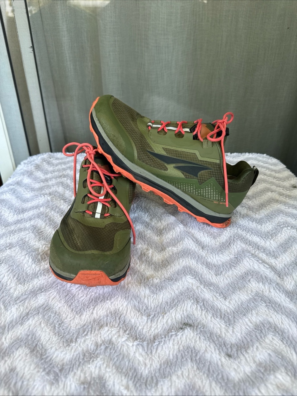 Altra women’s Olive Green Trail Runners with Orange Accents